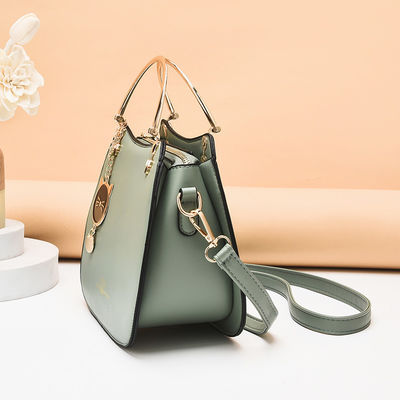 トレンドのシングルショルダー 女性用ハンドバッグ 猫のペンダントとジッパー閉塞